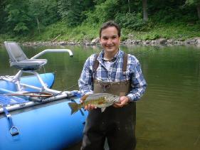 Here's a happy angler on one of our guided float fishing trips
